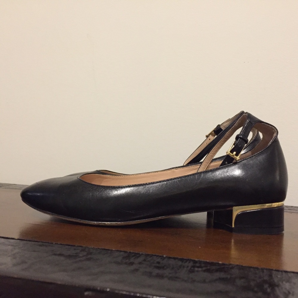 Cole Haan black leather flats with gold detail